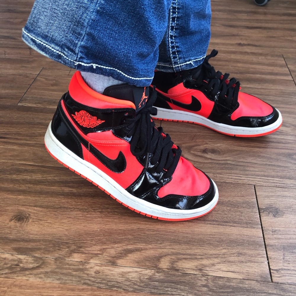 Black and red Air Jordan 1’s high tops satin top